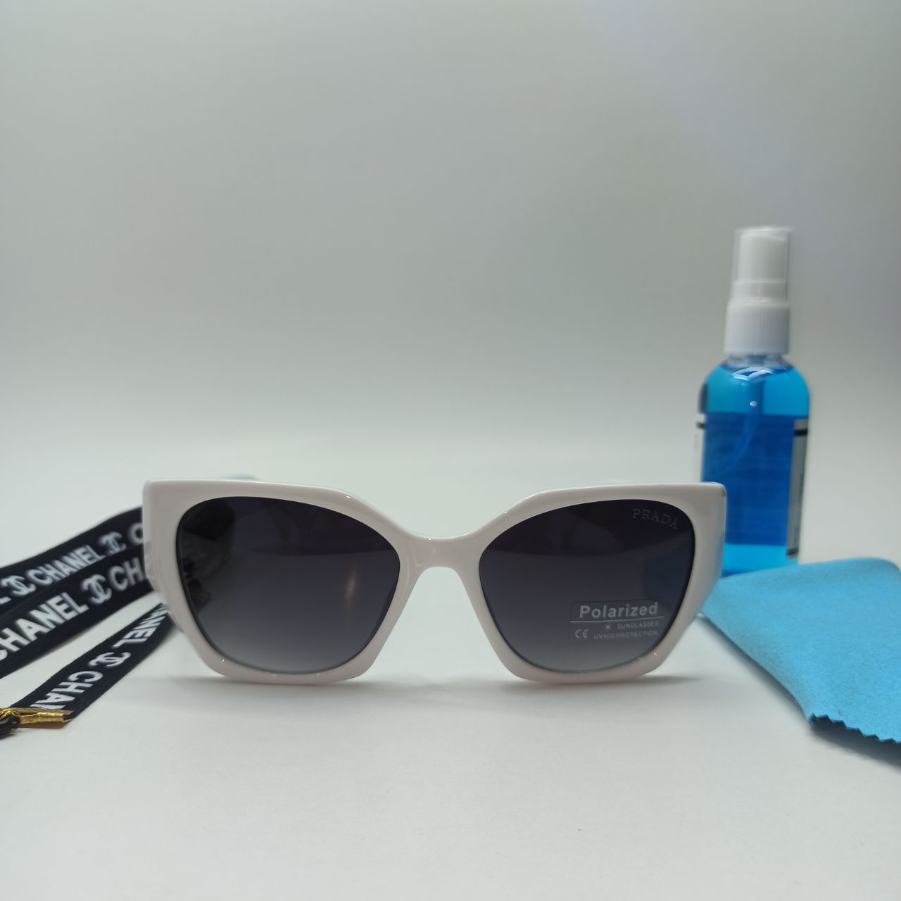 عینک آفتابی زنانه پلاریزه کائوچو پرادا PRADA مدل 2228