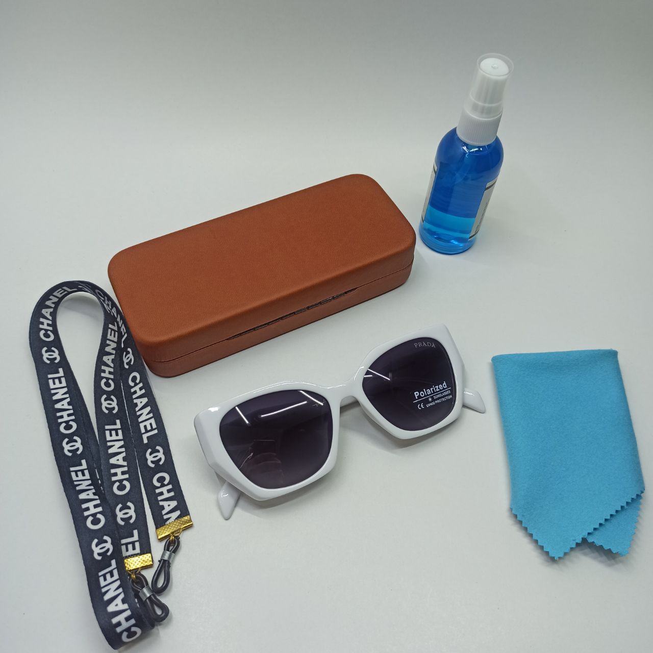 عینک آفتابی زنانه پلاریزه کائوچو پرادا PRADA مدل 2228