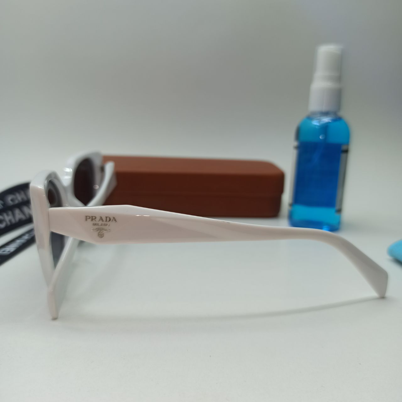 عینک آفتابی زنانه پلاریزه کائوچو پرادا PRADA مدل 2228