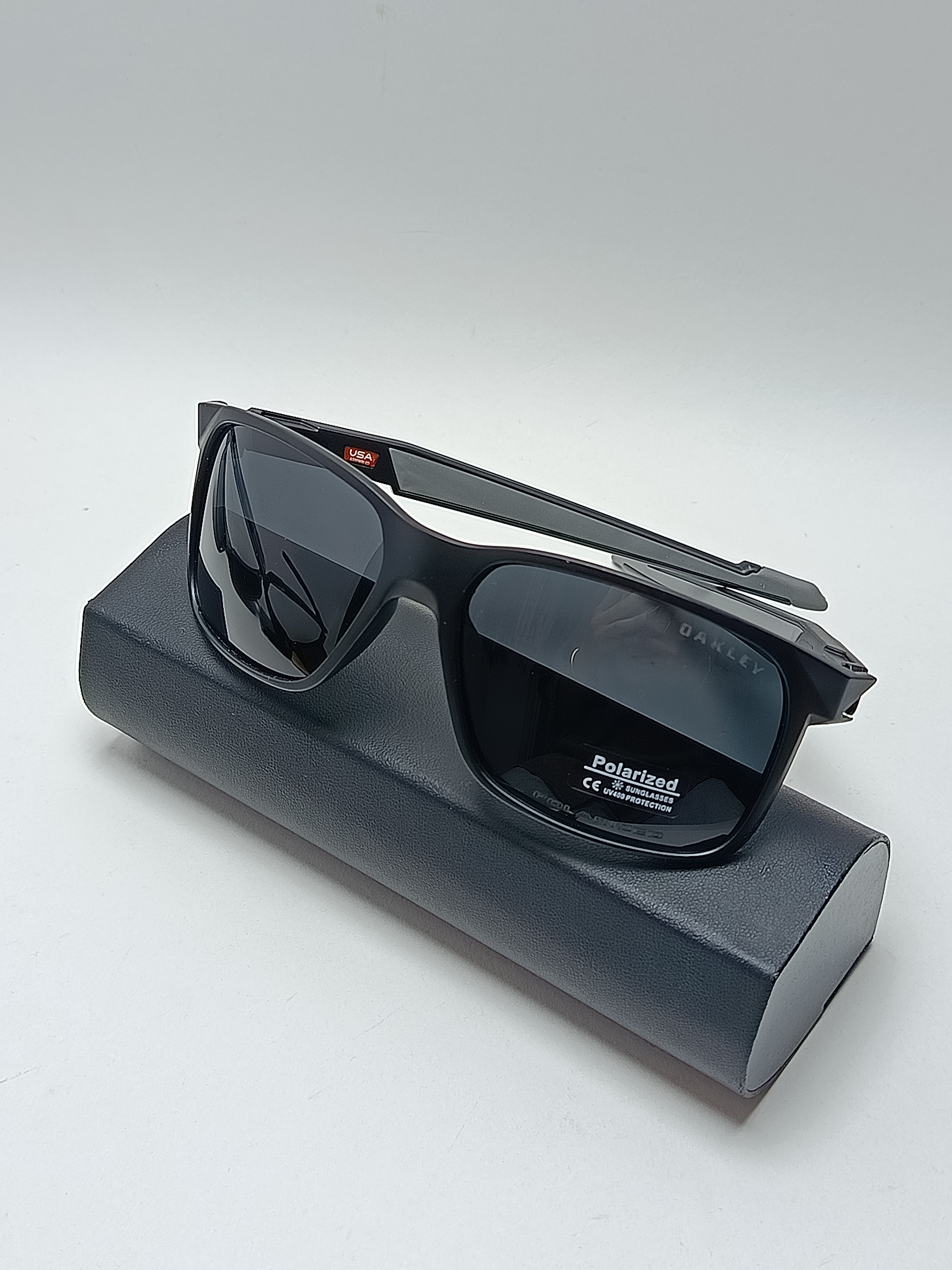 عینک ورزشی کائوچو پلاریزه Oakley مدل 25673